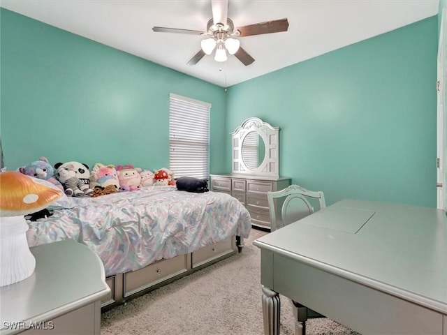 bedroom with light carpet and ceiling fan