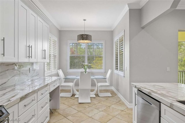 kitchen with tasteful backsplash, ornamental molding, white cabinets, and stainless steel dishwasher