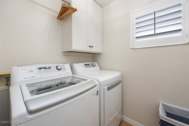 5644 Sandlewood Ct Unit 1903, Naples, FL 34110 - laundry room featuring washer and dryer, cabinet space, and baseboards
