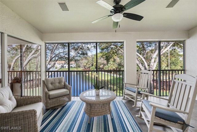 5644 Sandlewood Ct Unit 1903, Naples, FL 34110 - sunroom with a ceiling fan and a water view