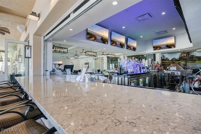 interior space with a kitchen bar