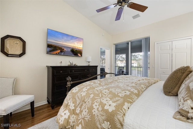 bedroom with hardwood / wood-style flooring, ceiling fan, lofted ceiling, and access to outside