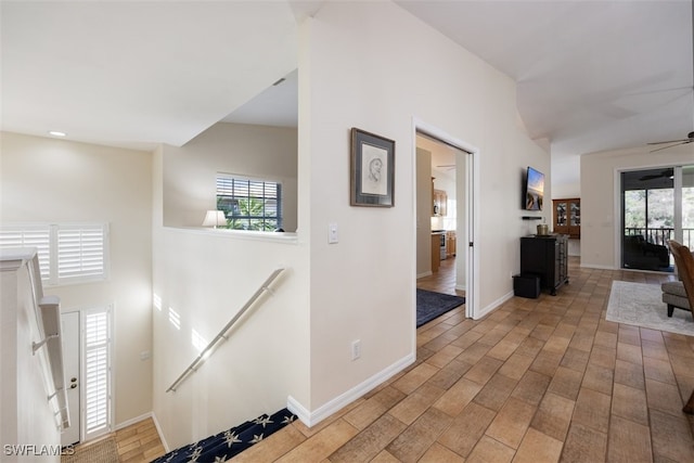 5644 Sandlewood Ct Unit 1903, Naples, FL 34110 - corridor featuring an upstairs landing, baseboards, and light wood finished floors