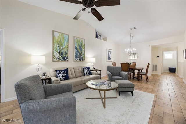5644 Sandlewood Ct Unit 1903, Naples, FL 34110 - living room featuring a chandelier, lofted ceiling, a ceiling fan, light wood finished floors, and baseboards