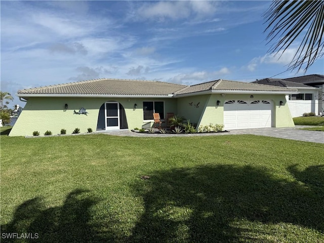 ranch-style house featuring an attached garage, stucco siding, a front yard, and a tiled roof