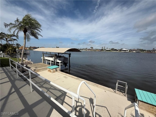 view of dock with a water view and boat lift