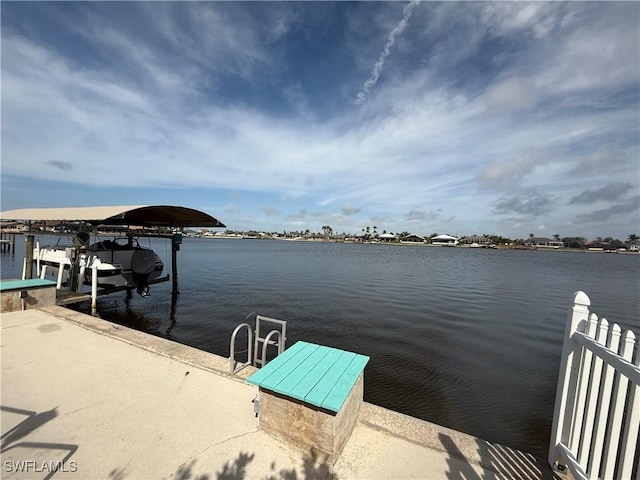 dock area featuring a water view and boat lift