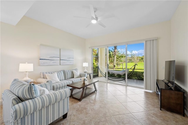 living room with light tile patterned floors and a ceiling fan