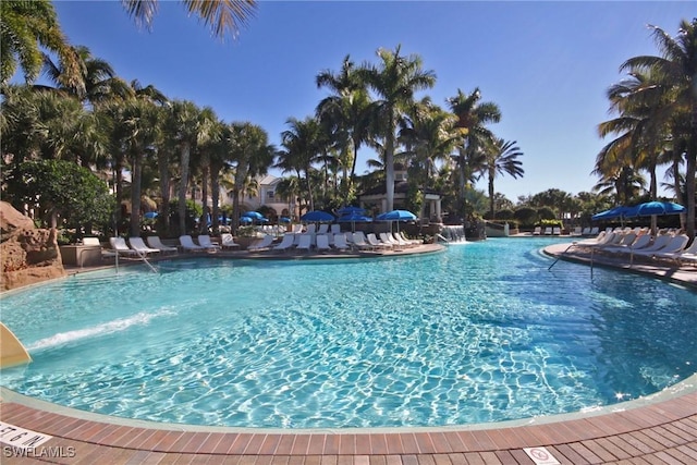 community pool featuring a patio area