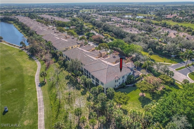 bird's eye view with a water view