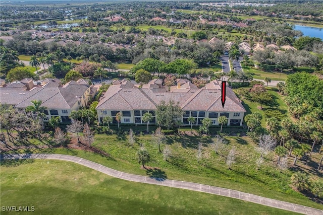 birds eye view of property featuring a water view and a residential view