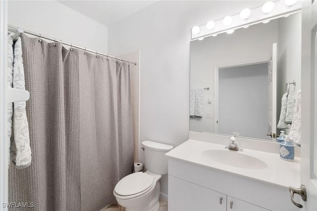 full bath featuring toilet, a shower with shower curtain, and vanity