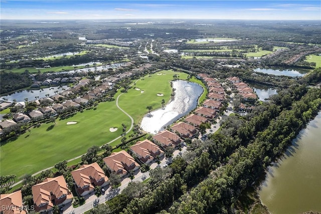 aerial view with a water view, a residential view, and view of golf course