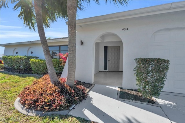 property entrance featuring a garage