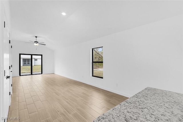 816 Gen D Macarthur Ave, Labelle, FL 33935 - spare room featuring a ceiling fan, lofted ceiling, baseboards, light wood finished floors, and recessed lighting