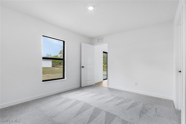 816 Gen D Macarthur Ave, Labelle, FL 33935 - carpeted empty room featuring baseboards