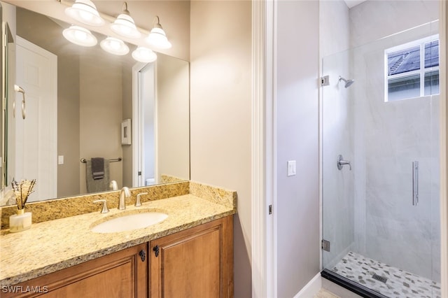 bathroom featuring vanity and walk in shower