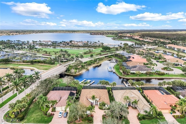 birds eye view of property featuring a water view