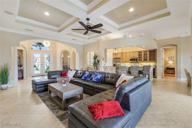 living room with french doors, light tile patterned flooring, coffered ceiling, beamed ceiling, and ornamental molding