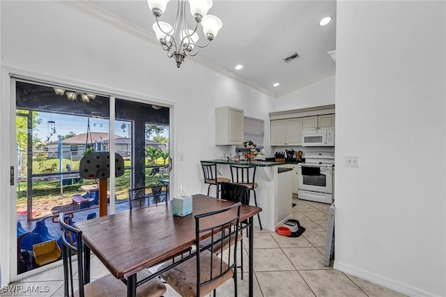 dining area featuring ornamental molding, light tile patterned floors, and a notable chandelier