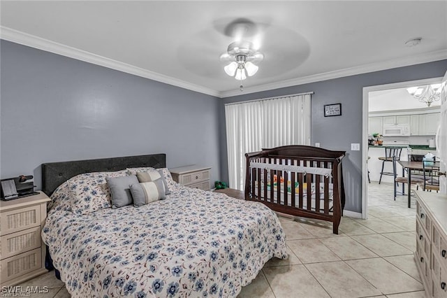 bedroom with ornamental molding, ceiling fan with notable chandelier, and light tile patterned floors