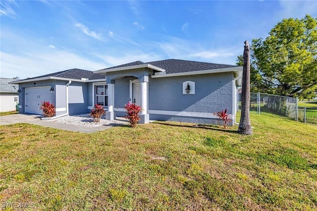 single story home with a garage and a front yard