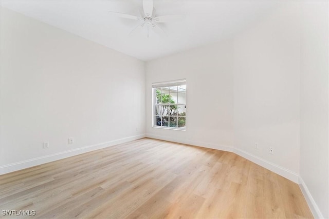 unfurnished room featuring ceiling fan and light wood-type flooring