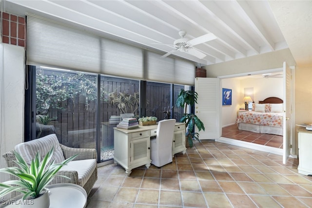 sunroom / solarium with beamed ceiling and ceiling fan