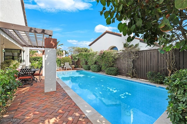 view of pool featuring a patio and a pergola