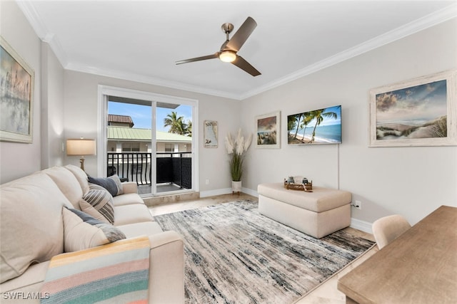 living room featuring ceiling fan and crown molding