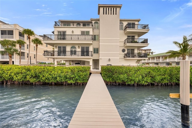 dock area featuring a water view