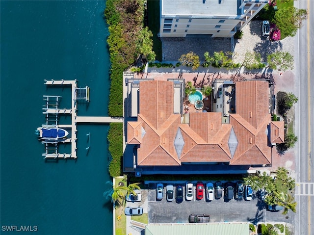 bird's eye view with a water view