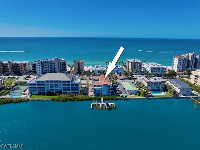 drone / aerial view featuring a water view