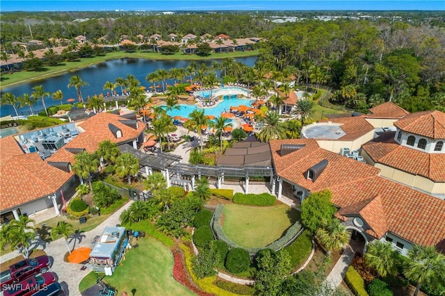 birds eye view of property featuring a water view