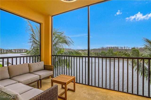 sunroom with a water view