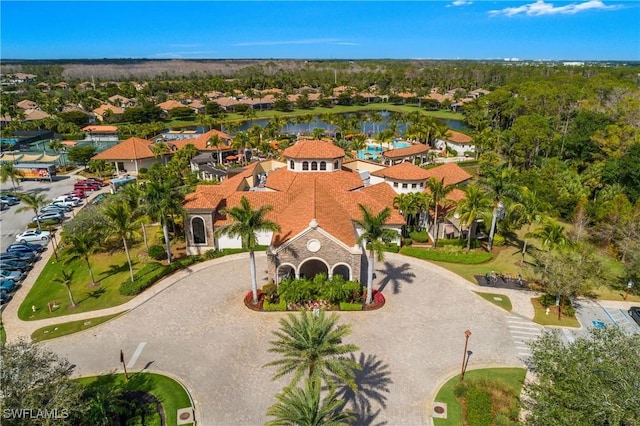 birds eye view of property with a residential view and a water view