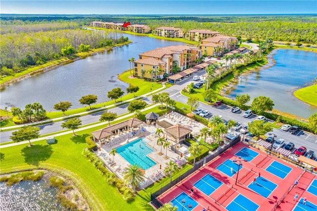 birds eye view of property featuring a water view