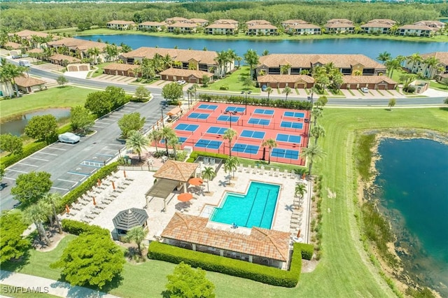 aerial view featuring a residential view and a water view