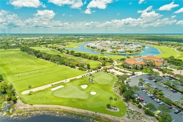 birds eye view of property featuring a water view and golf course view