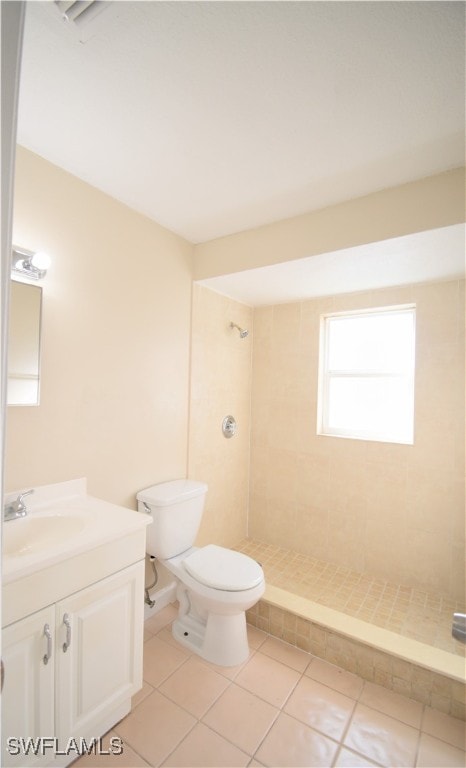 full bathroom with toilet, a shower stall, and vanity