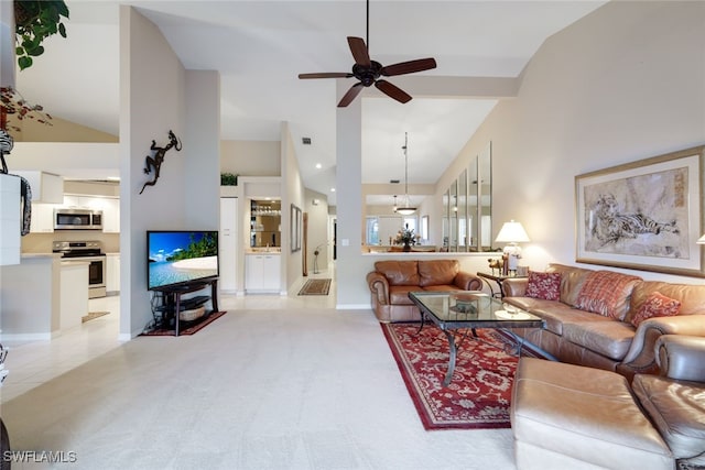 tiled living room with high vaulted ceiling and ceiling fan