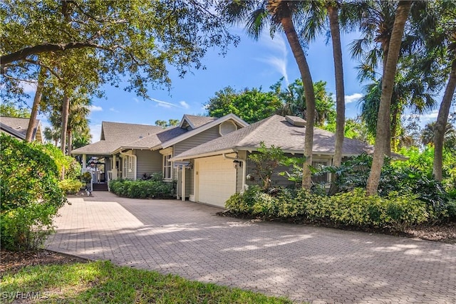 view of front of property featuring a garage