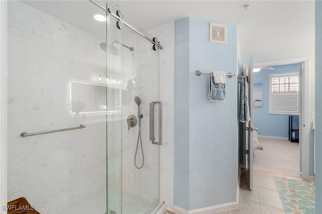 full bathroom with visible vents, a marble finish shower, and tile patterned floors