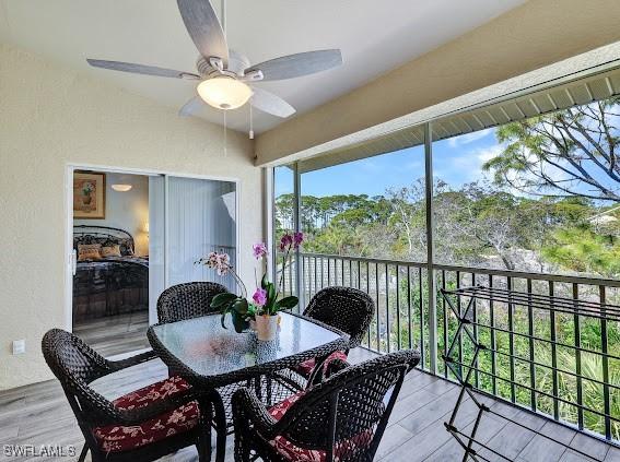 sunroom / solarium with ceiling fan