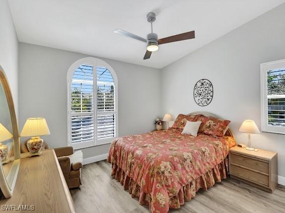 bedroom featuring ceiling fan and light hardwood / wood-style flooring