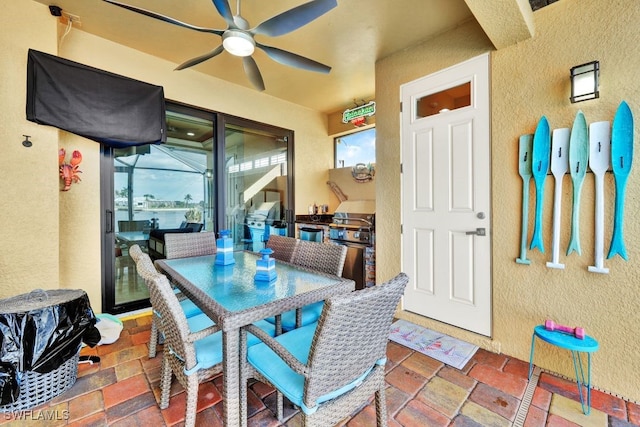 interior space with a grill and ceiling fan