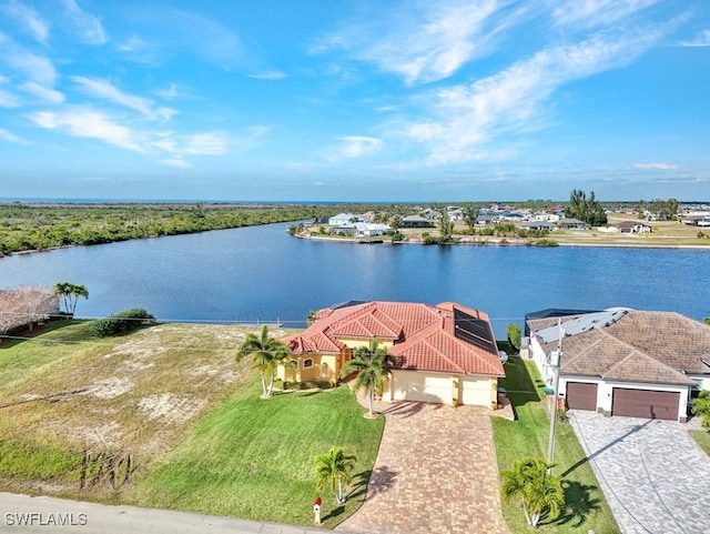 bird's eye view with a water view