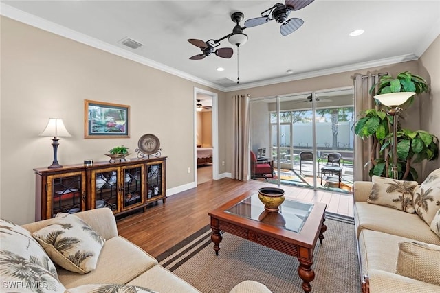 10641 Jackson Square Dr, Estero, FL 33928 - living area with ceiling fan, visible vents, crown molding, and wood finished floors