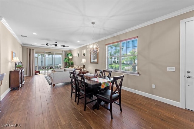 10641 Jackson Square Dr, Estero, FL 33928 - dining area featuring dark wood finished floors, a wealth of natural light, and visible vents