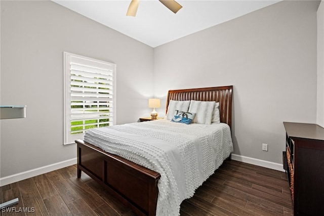 bedroom with dark wood-type flooring and ceiling fan